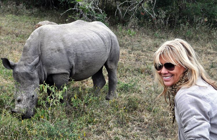 Guideposts: Françoise poses with a rhinocerous
