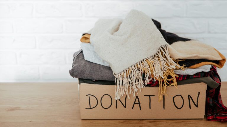 Pile clothes for donation in a decluttering project