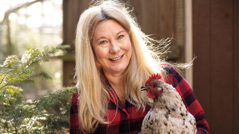 Author Lisa Steele at home with her chickens